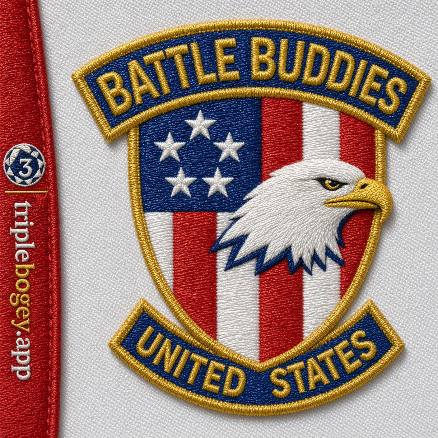 Close-up of the embroidered Battle Buddies USA shield on white nylon.